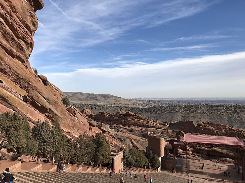 Beautiful Red Rocks and Denver buildings in the Distance