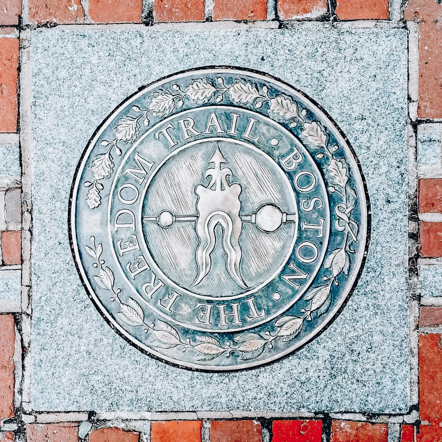 Freedom trail sidewalk emblem in Boston Massachusetts