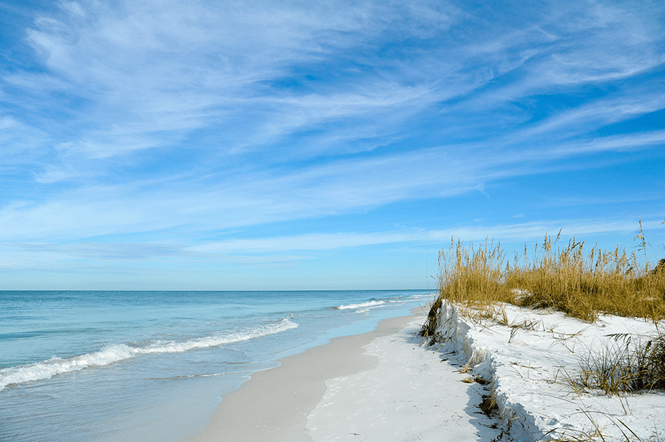 Beautiful beach on Anna Maria Island with white sands and blue water