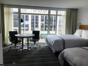 Beautiful interior of the Colonnade Hotel in Boston - floor to ceiling windows overlooking the city views