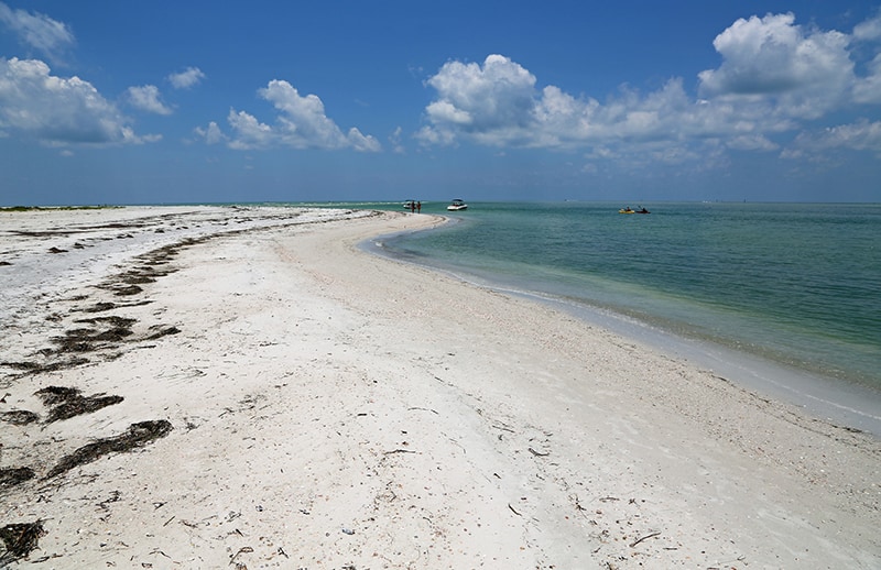Beautiful sand and turquoise and green water Caladesi Island State Park Florida
