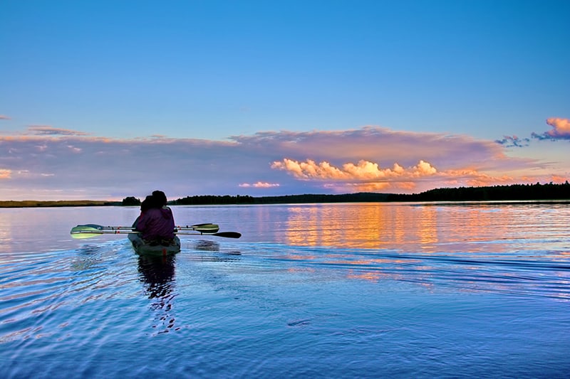 Kayaking at sunset into the evening - a great boat tour