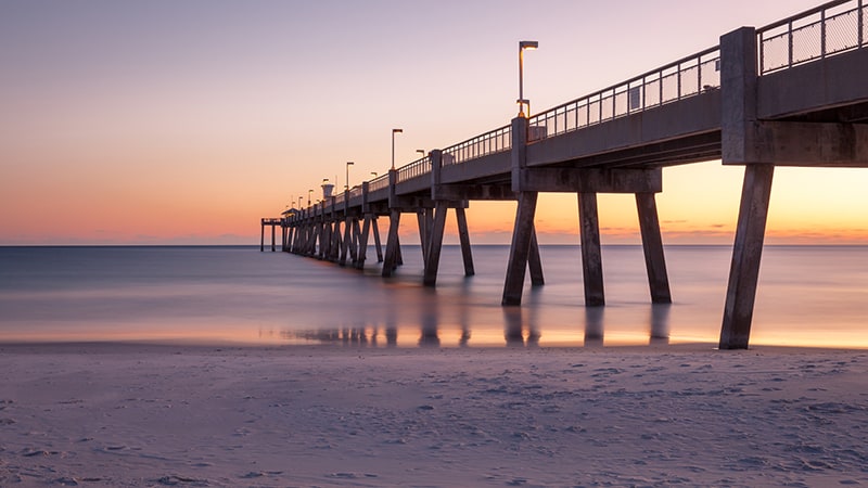 Panorama of Okaloosa fishing pier in Fort Walton Beach, Florida at sunset - Popular destination nearby Crab Island, Florida