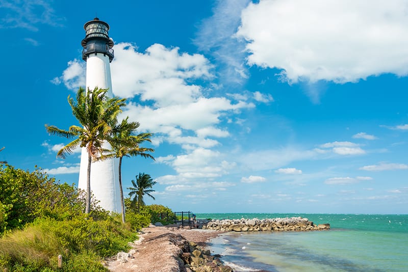 Famous lighthouse at Cape Florida in the south end of Key Biscayne , Miami