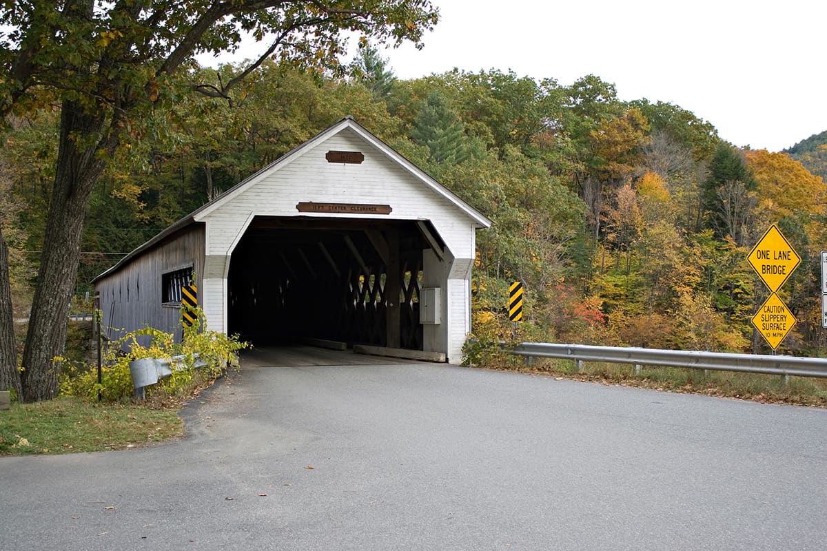 A historic New England covered bridge located in Dummerston Vermont.