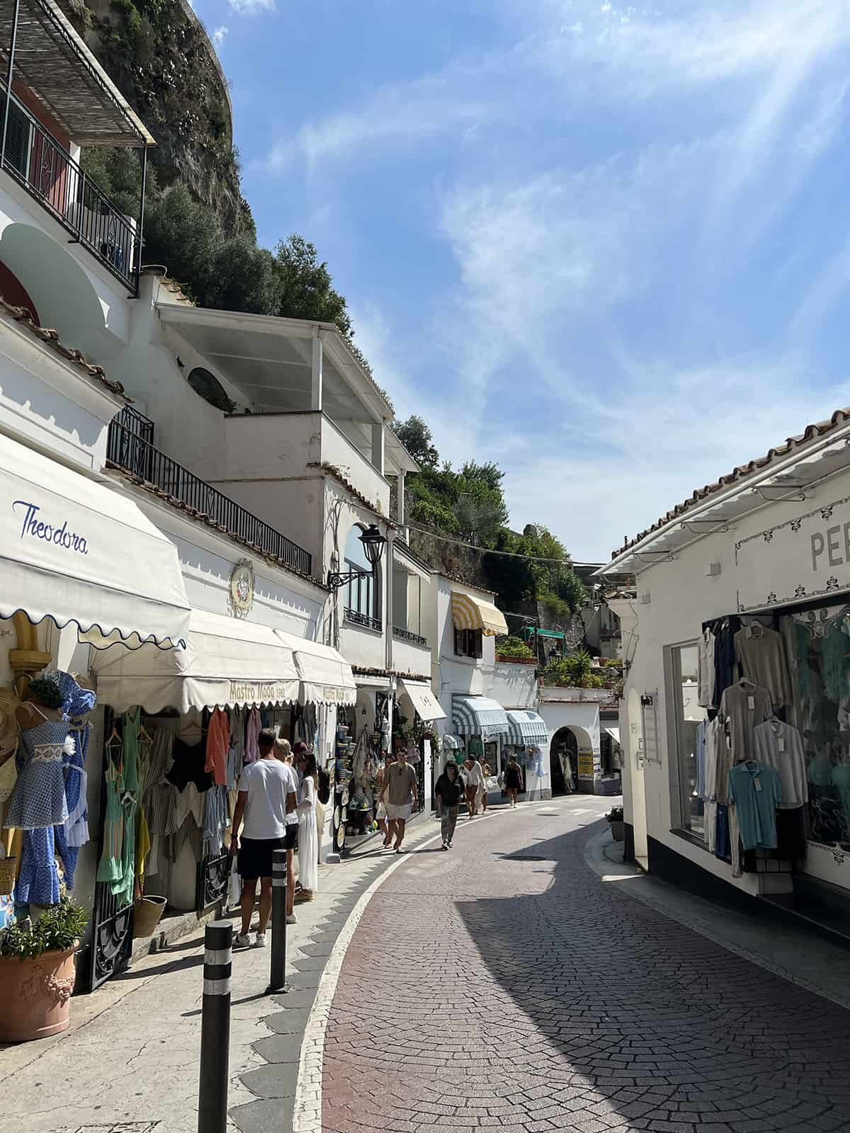 Main road in Positano city center with lots of shops