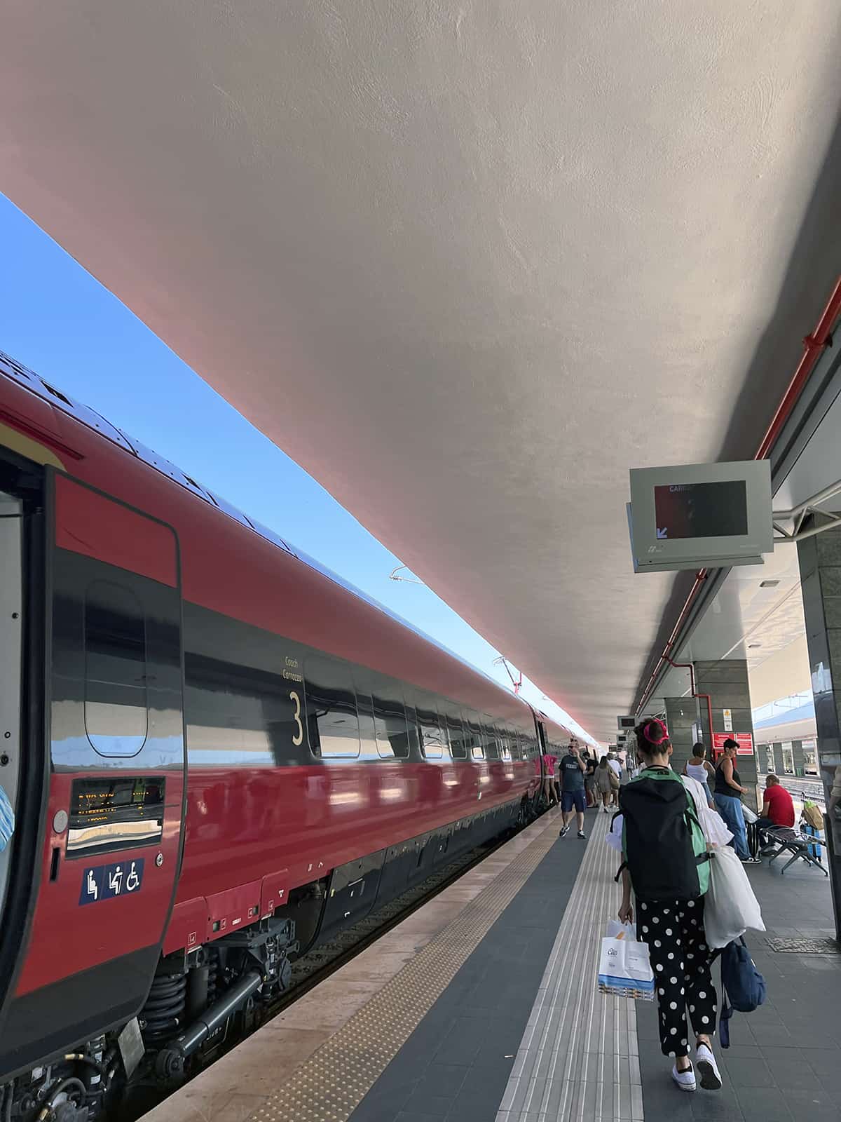 Naples italy red Italo train at the platform
