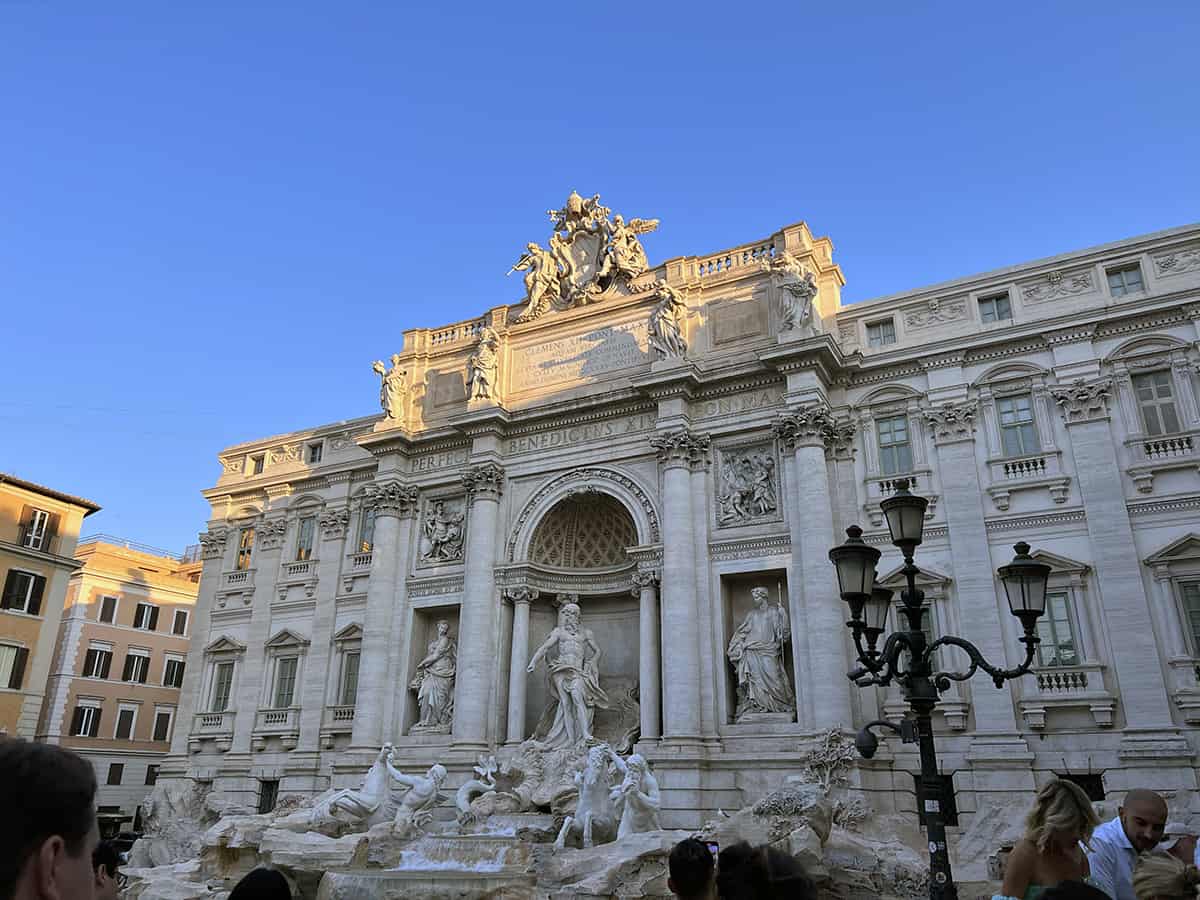 The stunning Trevi Fountain in Rome, Italy during the day - a top spot to visit on a golf cart tour